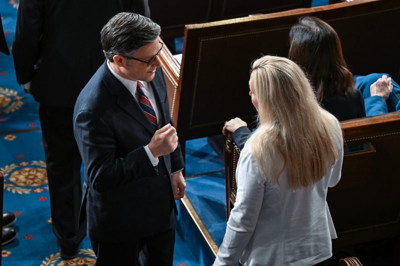 
                        House Speaker Mike Johnson (R-La.) and Rep. Marjorie Taylor Greene (R-Ga.) speak before Japanese Prime Minister Fumio Kishida addresses a joint meeting of Congress in the House Chamber at the Capitol in Washington, April 11, 2024.  (Jason Andrew/The New York Times)
                      