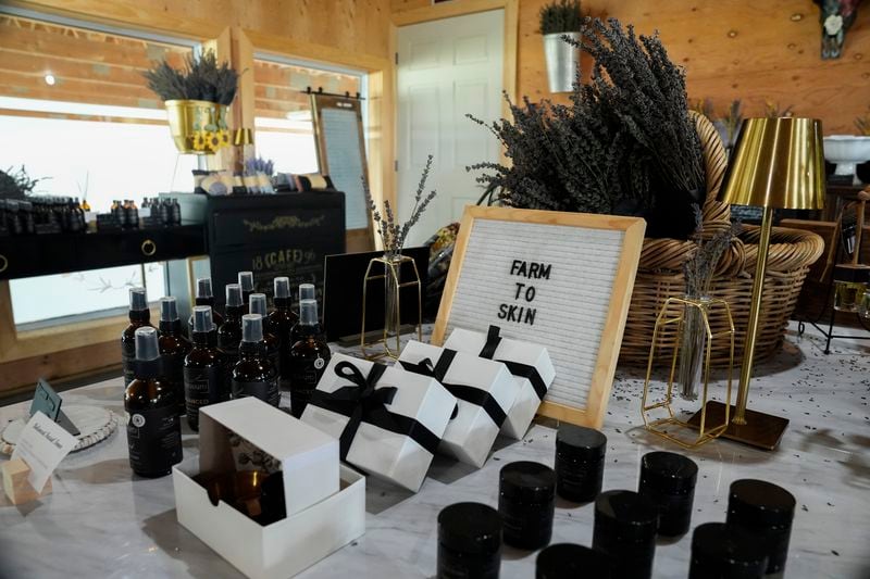 Lavender-infused beauty products sit out for sale, Wednesday, Aug. 21, 2024, at Hereward Farms in East Garafraxa, Ontario. (AP Photo/Joshua A. Bickel)