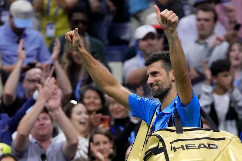 Novak Djokovic, of Serbia, reacts against Alexei Popyrin, of Australia, during a third round match of the U.S. Open tennis championships, Friday, Aug. 30, 2024, in New York. (AP Photo/Julia Nikhinson)