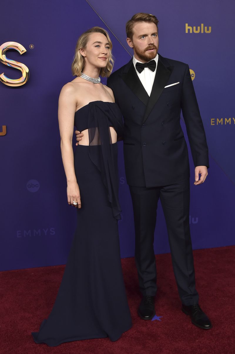 Saoirse Ronan, left, and Jack Lowden arrive at the 76th Primetime Emmy Awards on Sunday, Sept. 15, 2024, at the Peacock Theater in Los Angeles. (Photo by Richard Shotwell/Invision/AP)