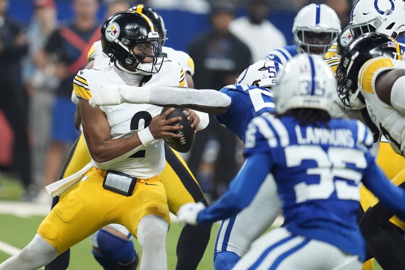 Pittsburgh Steelers quarterback Justin Fields (2) looks to pass during the first half of an NFL football game against the Indianapolis Colts, Sunday, Sept. 29, 2024, in Indianapolis. (AP Photo/Michael Conroy)