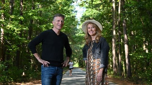 Kevin Avery and Taylor Scott, hosts of "The Kevin & Taylor Show, on Silver Comet trail in Smyrna on Thursday, Oct. 1, 2020. They are celebrating their 20th anniversary of the morning show at 104.7/The Fish. (Hyosub Shin / Hyosub.Shin@ajc.com)