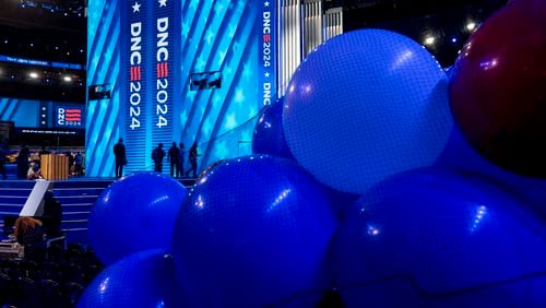 Workers prepare for next week's Democratic National Convention at the United Center in Chicago, Thursday, Aug. 15, 2024. (AP Photo/J. Scott Applewhite)