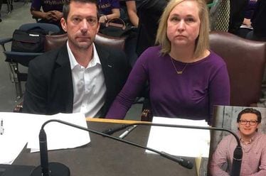 Steve (left) and Rae Ann Gruver testified in favor of an anti-hazing bill in the Louisiana House Criminal Justice Committee on March 21, 2018. Their son Max was a victim of hazing at Louisiana State University. He died Sept. 14, 2017. His photo sits on the table. (Courtesy)