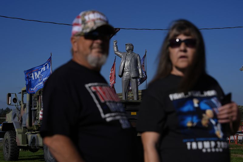 Supporters arrive before Republican presidential nominee former President Donald Trump speaks at a campaign rally at the Butler Farm Show, Saturday, Oct. 5, 2024, in Butler, Pa. (AP Photo/Julia Demaree Nikhinson)