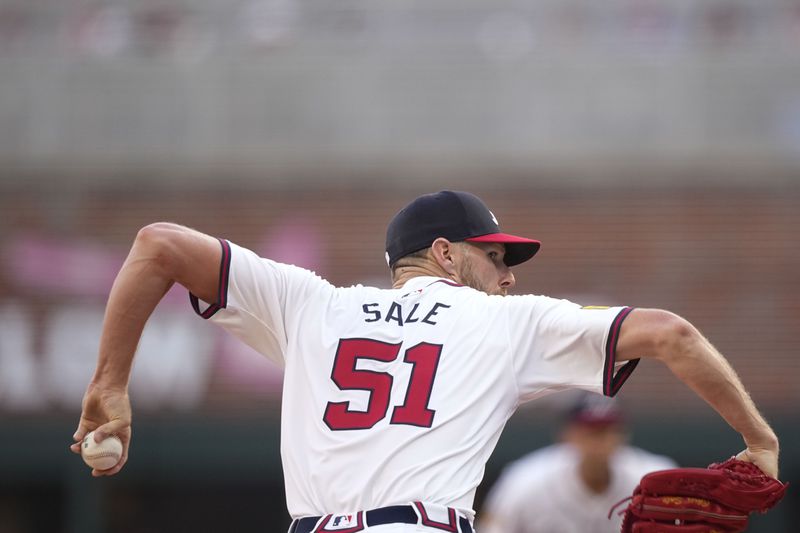 Atlanta Braves pitcher Chris Sale (51) delivers in the first inning of a baseball game against the San Francisco Giants, Wednesday, July 3, 2024, in Atlanta. (AP Photo/Brynn Anderson)