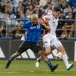 CF Montreal's Josef Martinez, left, battles San Jose Earthquakes' Daniel Munie during the first half of an MLS soccer match in Montreal, Saturday, September 28, 2024. (Peter McCabe/The Canadian Press via AP)