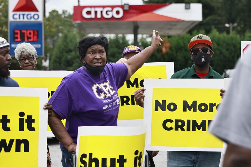 Sandra Murphy, a member of the Adamsville community talks about her cousin that was shot and killed at the Citgo gas station on Martin Luther King Jr. Drive during a rally against violent crime on Wednesday, August 17, 2022. (Natrice Miller/natrice.miller@ajc.com)