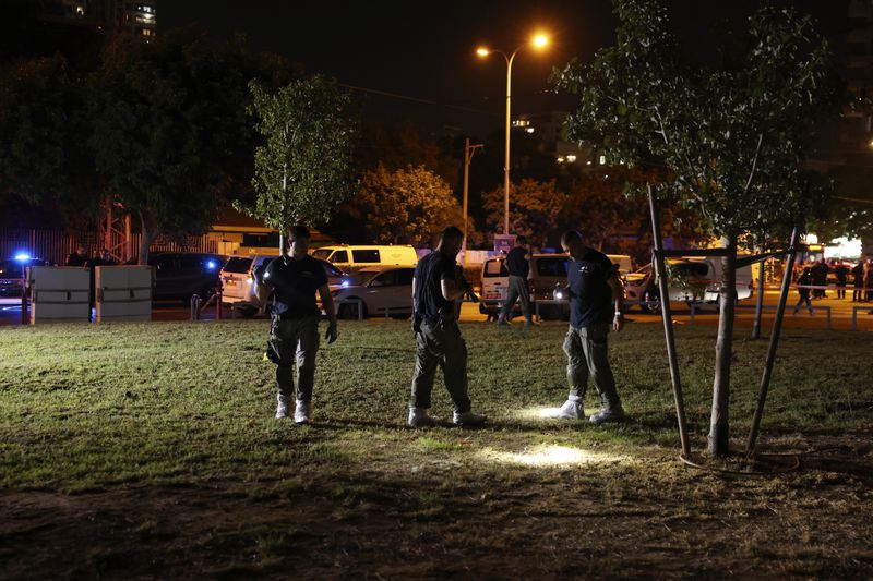 Israeli police work at the scene of a bomb explosion in Tel Aviv, Israel, Sunday, Aug. 18, 2024. Israeli police say one person was killed and another moderately injured. (AP Photo/Moti Milrod)