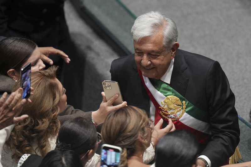 Outgoing President Andrés Manuel López Obrador arrives at Congress for the swearing-in of Claudia Sheinbaum as Mexico's new president in Mexico City, Tuesday, Oct. 1, 2024. (AP Photo/Fernando Llano)