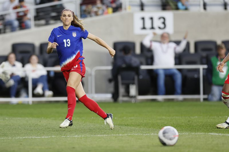 FILE - United States' Alex Morgan plays against Canada during a SheBelieves Cup women's soccer match Tuesday, April 9, 2024, in Columbus, Ohio. (AP Photo/Jay LaPrete, File)