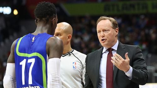 March 6, 2017, Atlanta: Atlanta Hawks head coach Mike Budenholzer speaks with guard Dennis Schroder before benching him in the third quarter for the remainder of the game against the Golden State Warriors during a NBA basketball game on Monday, March 6, 2017, in Atlanta.   Curtis Compton/ccompton@ajc.com