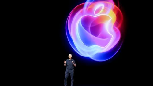 Apple CEO Tim Cook talks on the stage during an announcement of new products at Apple headquarters Monday, Sept. 9, 2024, in Cupertino, Calif. (AP Photo/Juliana Yamada)