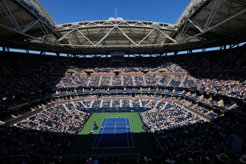 Emma Navarro, of the United States, serves to Paula Badosa, of Spain, during the quarterfinals of the U.S. Open tennis championships, Tuesday, Sept. 3, 2024, in New York. (AP Photo/Kirsty Wigglesworth)