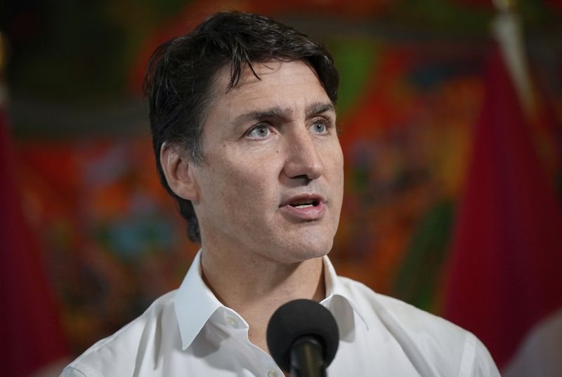 Canada Prime Minister Justin Trudeau speaks to reporters at the Liberal Caucus retreat in Nanaimo, British Columbia, Wednesday, Sept. 11, 2024. (Darryl Dyck/The Canadian Press via AP)