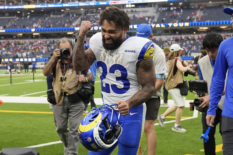 Los Angeles Rams running back Kyren Williams (23) celebrates after the Rams defeated the San Francisco 49ers in an NFL football game, Sunday, Sept. 22, 2024, in Inglewood, Calif. (AP Photo/Ashley Landis)