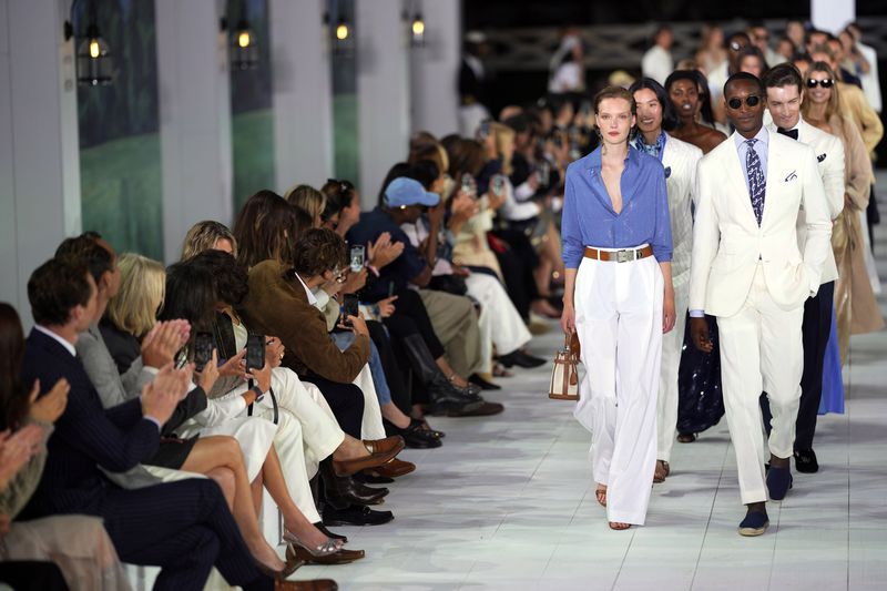 Models walk the runway during the Ralph Lauren Spring/Summer 2025 fashion show as part of New York Fashion Week on Thursday, Sept. 5, 2024, at Khalily Stables in Bridgehampton, N.Y. (Photo by Charles Sykes/Invision/AP)