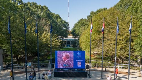 Video screen set up in front of the Jimmy Carter Library and Museum in Atlanta, showing a mosaic of people wishing President Carter a happy 99th birthday in September of 2023.   Photo by Michael  A. Schwarz/The Carter Center