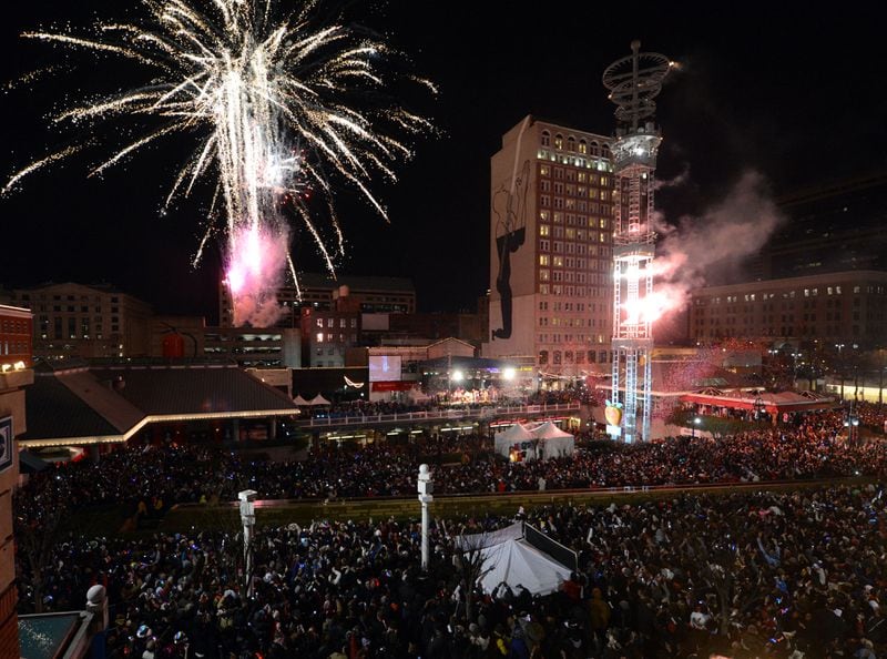 DECEMBER 31, 2012 ATLANTA The crowd celebrates the New Year at Underground Atlanta for the 24th annual Peach Drop in downtown Atlanta Tuesday January 1, 2013. A crowd of a hundred thousand people watched the Peach Drop and fireworks signaling the end of 2012 and the beginning of 2013 KENT D. JOHNSON / KDJOHNSON@AJC.COM