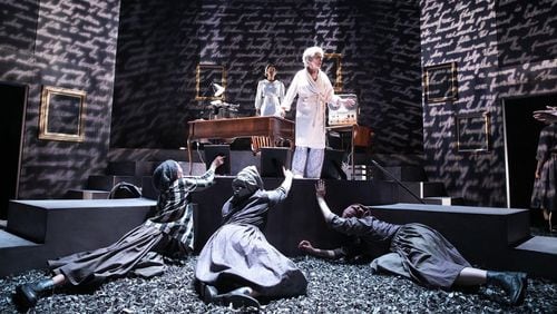 Soprano Maria Kanyova (center) performs with the company in the Atlanta Opera production of Jake Heggie’s “Out of Darkness: Two Remain.” CONTRIBUTED BY JEFF ROFFMAN
