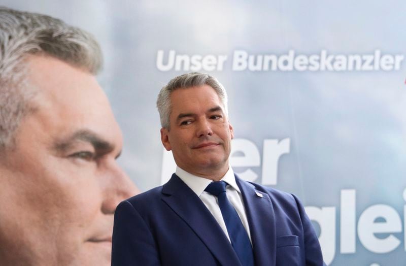 Austrian Chancellor Karl Nehammer of the Peoples Party (OeVP) attends his final election rally in Vienna, Austria, Friday, Sept. 27, 2024. (AP Photo/Heinz-Peter Bader)