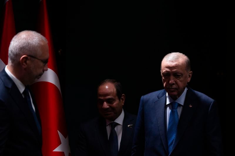 Turkish President Recep Tayyip Erdogan, right, and Egyptian President Abdel Fattah el-Sissi arrive for a bilateral signature agreements ceremony at the Presidential palace in Ankara, Wednesday, Sept. 4, 2024. (AP Photo/Francisco Seco)