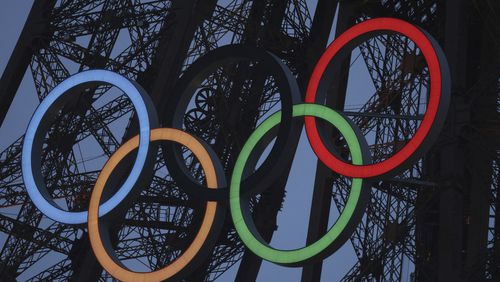 FILE - A general view of the Olympic rings displayed on the Eiffel Tower is pictured during the opening ceremony for the 2024 Summer Olympic Games. (Nir Elias/Pool Photo via AP, File)