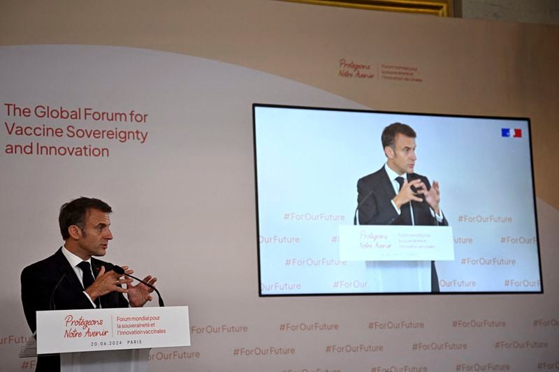 French President Emmanuel Macron delivers his speech during the opening session of the the African Vaccine Manufacturing Accelerator conference, Thursday, June 20, 2024 in Paris. French President Emmanuel Macron is joining some African leaders to kick off a planned $1 billion project to accelerate the rollout of vaccines in Africa, after the coronavirus pandemic bared gaping inequalities in access to them. (Dylan Martinez/Pool via AP)