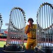 The Savannah Bananas  took their World Tour to a sold-out Fenway Park on Saturday, June 8, 2024, as they played the Party Animals  before over 37,000 fans in an entertaining take on traditional big league baseball.  Bananas Ethan Skuija blows a kiss at the three Red Sox World Series trophies on display in the outfield. “How do we get one of these?” Skuija said as he chuckled. (John Tlumacki/Boston Globe)