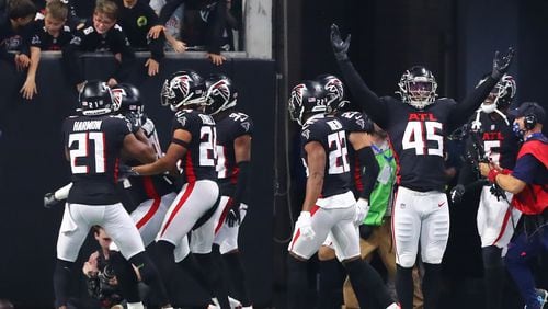 Falcons linebacker Deion Jones (right), who was placed on the physically-unable-to-perform list Thursday, reported early for training camp Tuesday. (Curtis Compton / Curtis.Compton@ajc.com)