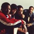 An early photo of FUBU co-founders Carlton Brown, Keith Perrin, Daymond John and J. Alexander Martin. Courtesy