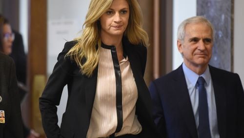 NASHVILLE, TN - MARCH 04: (L-R) Sportscaster Erin Andrews and attorney Bruce Broillet return to the courtroom for final remarks on March 4, 2016 in Nashville, Tennessee. Andrews is taking legal action against the operator of the Nashville Marriott at Vanderbilt University, where she was staying while covering a football game for ESPN, for invasion of privacy in a USD 75 million dollar suit after a man at the hotel took a nude video of her through her hotel room door peep hole in 2008. (Photo by Erika Goldring/Getty Images)