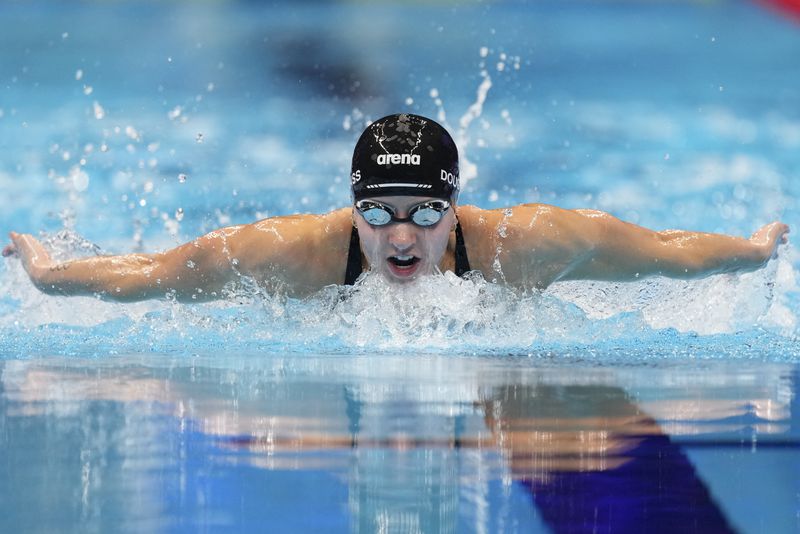 Kate Douglass swims during the Women's 200 individual medley semifinals heat Friday, June 21, 2024, at the US Swimming Olympic Trials in Indianapolis. (AP Photo/Michael Conroy)