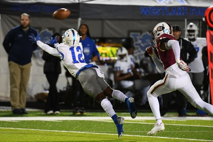 Jabari Jones,  wide receiver for Westlake, dives for a catch. (Jamie Spaar for the Atlanta Journal Constitution)