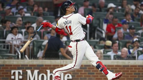 Atlanta Braves shortstop Orlando Arcia hits a two-run home run during the fourth inning against the Philadelphia Phillies at Truist Park, Wednesday, August 21, 2024, in Atlanta. (Jason Getz / AJC)
