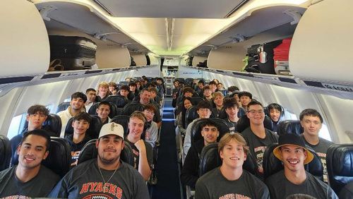 The New Westminster Hyacks football team is shown on their inbound plane from British Columbia to Atlanta. The Hyacks will play Mary Persons High on Saturday.