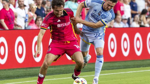 St. Louis City SC midfielder Indiana Vassilev (19) battles Atlanta United defender Noah Cobb (24) for the ball during the first half of an MLS soccer game at CityPark stadium in St. Louis on Saturday, June 22, 2024. (Dominic Di Palermo/St. Louis Post-Dispatch via AP)