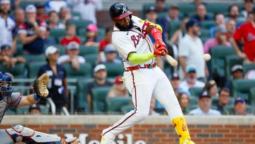 Atlanta Braves designated hitter Marcell Ozuna (20) hits a two-run single during the seventh inning against the New York Mets at Truist Park on Monday, Sept. 30, 2024, in Atlanta. 
(Miguel Martinez/ AJC)