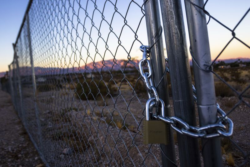 A construction fence secures the site where The Church of Jesus Christ of Latter-day Saints plans to build a new temple near Las Vegas, Sept. 27, 2024. (AP Photo/Ty ONeil)