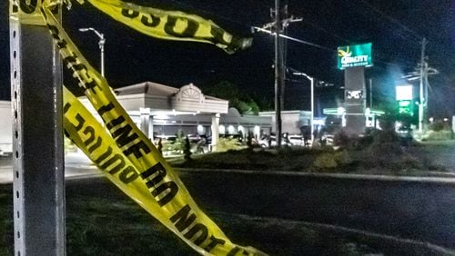 The victim was found with fatal gunshot wounds outside a Quality Inn & Suites near McDonough.