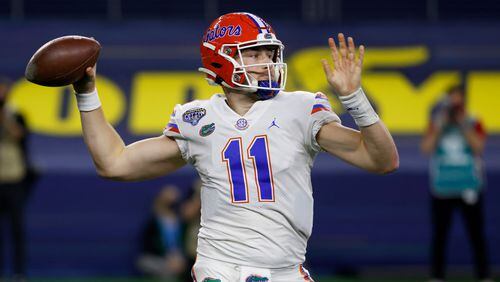 Florida quarterback Kyle Trask throws a pass during the first half of the team's Cotton Bowl NCAA college football game against Oklahoma in Arlington, Texas, Wednesday, Dec. 30, 2020. (AP Photo/Ron Jenkins)