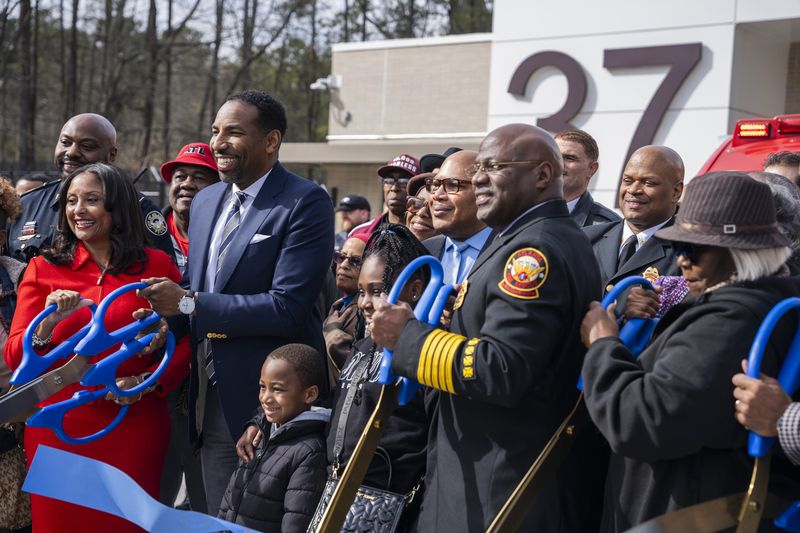 Mayor Andre Dickens and City Council Members speak at the opening of the first fire station in Southwest Atlanta on Thursday, Feb. 8, 2024. (Olivia Bowdoin for the AJC). 