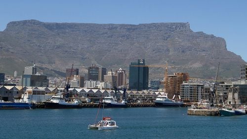 Table Mountain stands beyond the harbor area in Cape Town, South Africa, on Dec. 20, 2016. (Photo: Dean Hutton/Bloomberg)