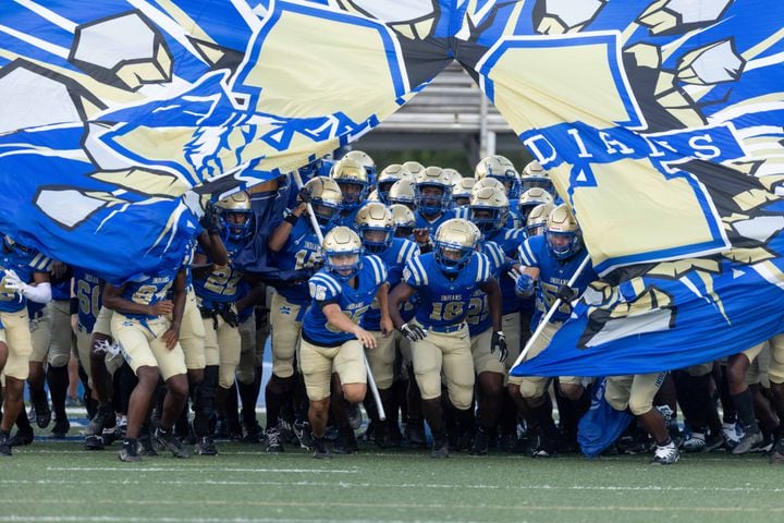 McEachern takes the field during a GHSA High School football game between Langston Hughes High School and McEachern High School at McEachern High School in Powder Springs, GA., on Friday, August 26, 2022. (Photo by Jenn Finch)