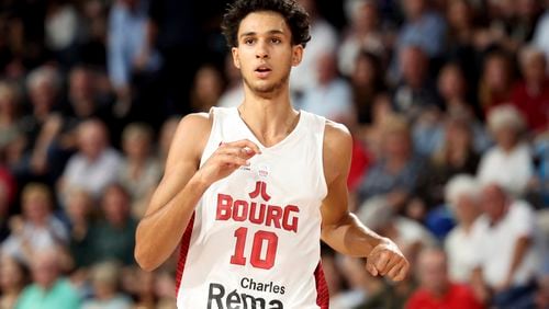 Zaccharie Risacher, of Bourg-en-Bresse, reacts during a Betclic Elite basketball game against Limoges in Bourg-en-Bresse, eastern France, on Oct. 31, 2023. Risacher could be the top pick in the June 26, NBA draft. (AP Photo)