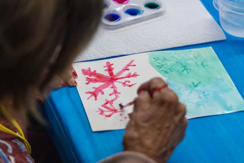 A member works on art project during a Respite Care Atlanta meeting at Second-Ponce de Leon Baptist Church in Atlanta. 
PHIL SKINNER FOR THE ATLANTA JOURNAL-CONSTITUTION