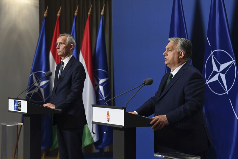 Hungarian Prime Minister Viktor Orban, right, and NATO Secretary General Jens Stoltenberg hold a press conference following their meeting in the government headquarters in Budapest, Hungary, Wednesday, June 12, 2024. (Zoltan Mathe/MTI via AP)