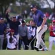 United States team member Patrick Cantlay reacts after making the winning putt on the 18th hole during their fourth round foursomes match at the Presidents Cup golf tournament at Royal Montreal Golf Club Saturday, Sept. 28, 2024 in Montreal. (Nathan Denette/The Canadian Press via AP)