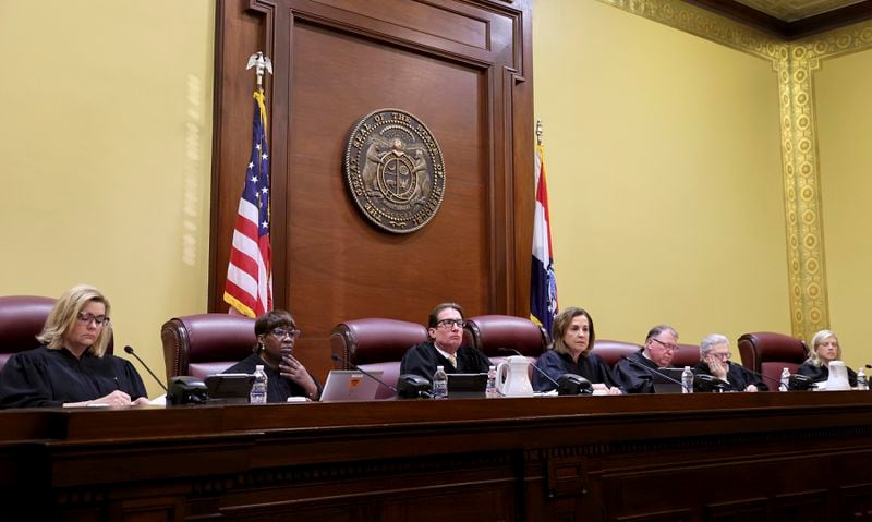 The Missouri Supreme Court Justices Kelly Broniec, Robin Ransom, Brent Powell, Mary Russell, Zel Fischer, Paul Wilson and Ginger Gooch take the bench to hear a case questioning whether an amendment to overturn the state's abortion ban will remain on the November ballot, Sept. 10, 2024, in Jefferson City, Mo. (Robert Cohen/St. Louis Post-Dispatch via AP, Pool)