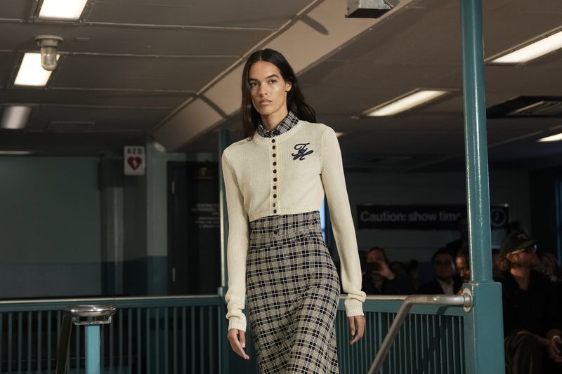 A model walks the runway during the Tommy Hilfiger Spring/Summer 2025 fashion show onboard a Staten Island Ferry as part of New York Fashion Week on Sunday, Sept. 8, 2024, in New York. (Photo by Charles Sykes/Invision/AP)